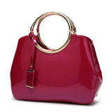 Glossy patent leather handbag