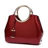 Glossy patent leather handbag