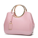 Glossy patent leather handbag