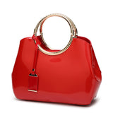 Glossy patent leather handbag