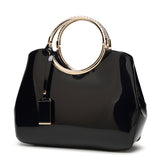 Glossy patent leather handbag